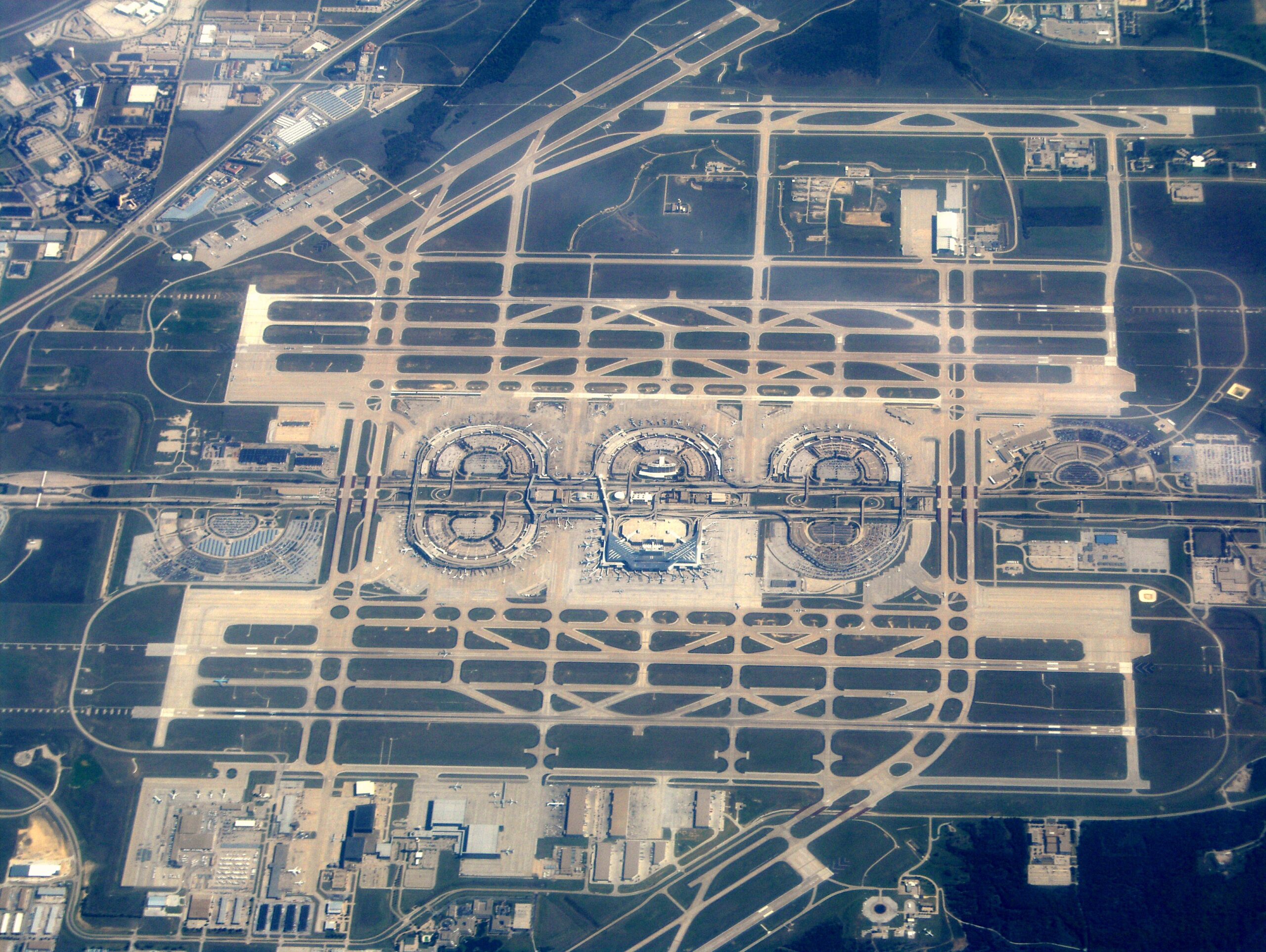 Fort Worth International Airport runway with airplanes ready for takeoff 