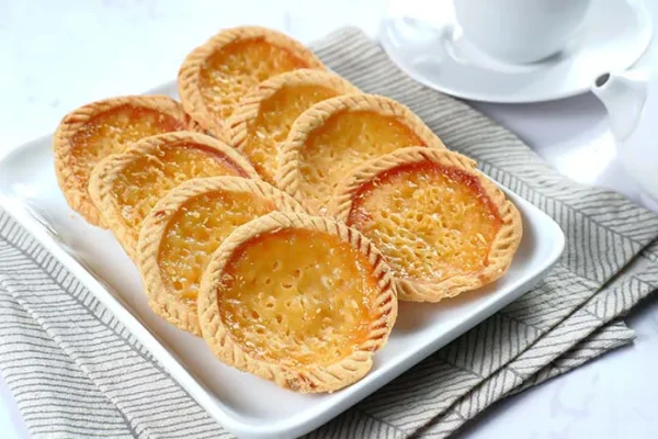 Pie Susu: Lezatnya Klasik yang Menjadi Ikon Kuliner Nusantara Pie Susu: Sejarah dan Asal-Usul Camilan Favorit Bali